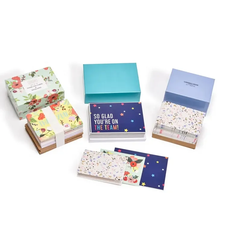 Custom paper gift boxes and greeting card packaging sets in floral and solid color designs - folding carton boxes printed with custom artwork for retail brands